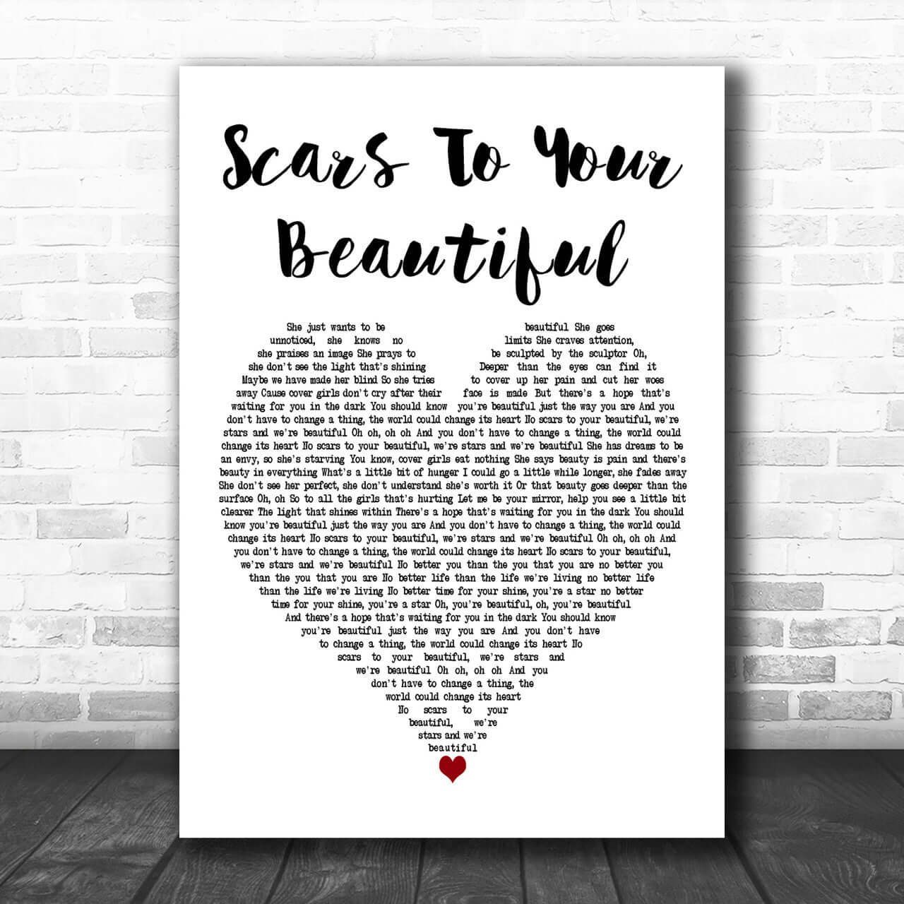 Inspirational wall art featuring the text 'Scars To Your Beautiful' in a heart shape design, promoting self-love and acceptance.