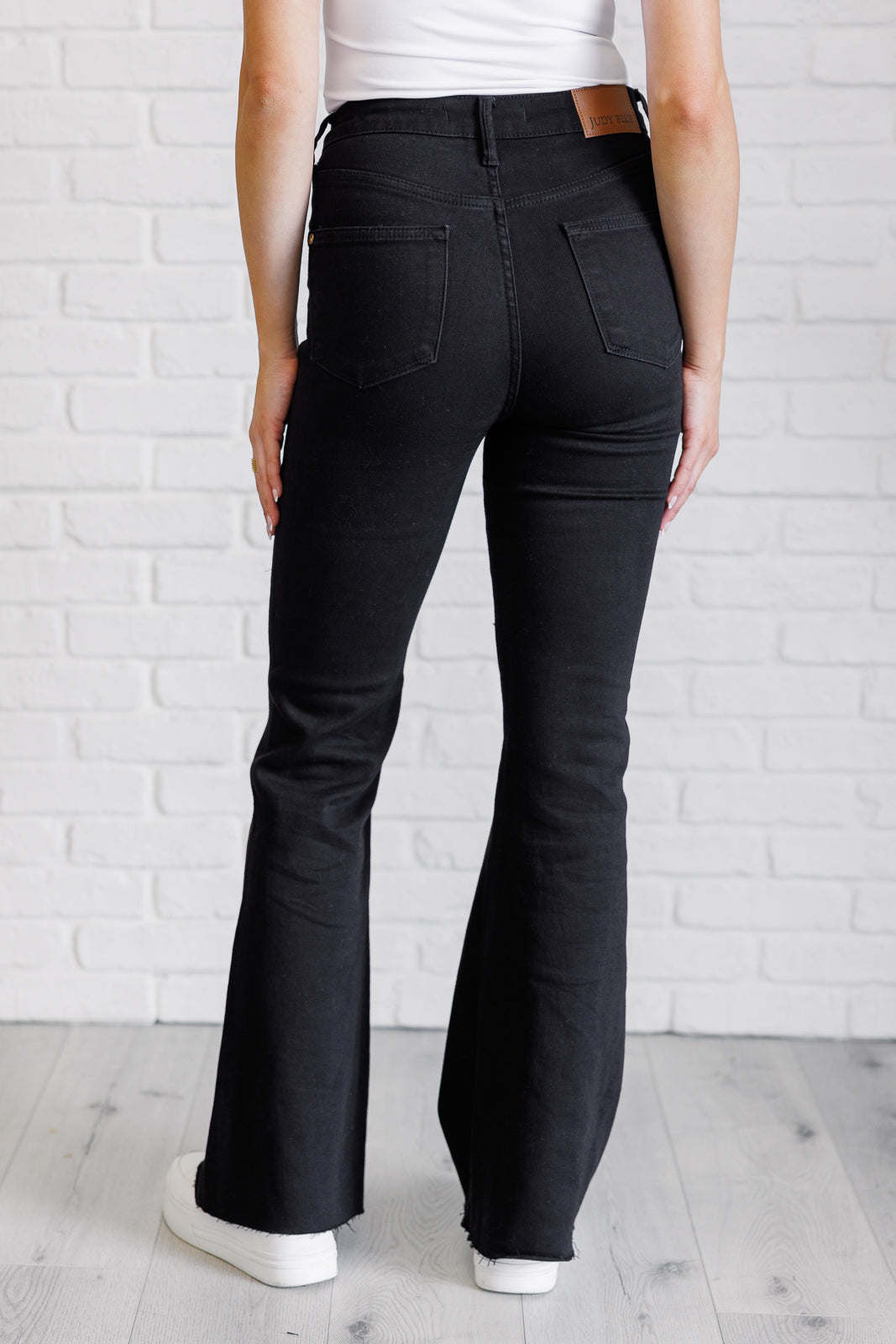 Etta High Rise Control Top Flare Jeans in Black - 1985 the VAULT Boutique