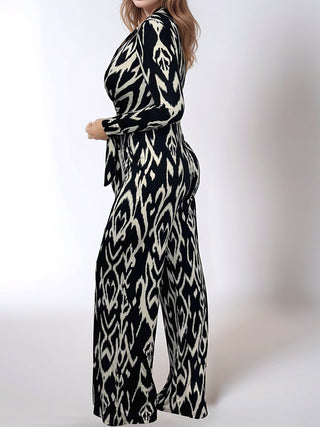 Full Size Leopard Tie Waist Long Sleeve Jumpsuit Plus Size - 1985 the VAULT Boutique