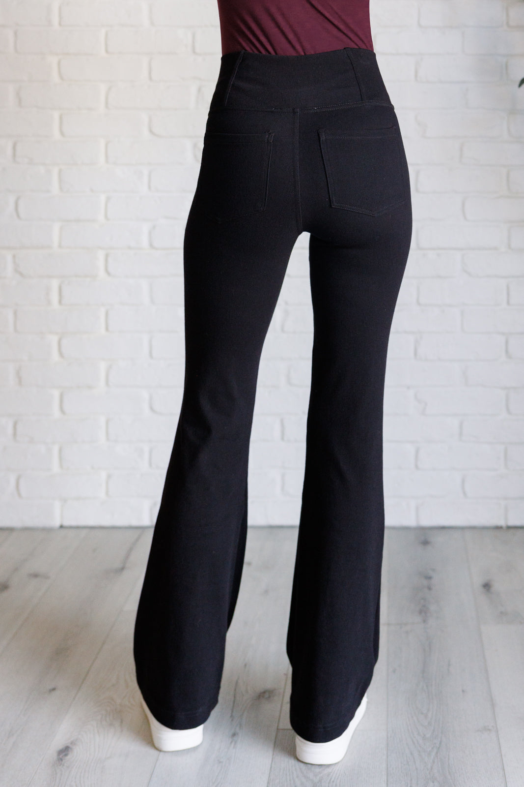 Building Habits Twill Flared Crossover Waist Pant in Black - 1985 the VAULT Boutique