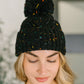 Cover Your Ears Pom Pom Beanie in Black
