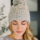 Cover Your Ears Pom Pom Beanie in Grey