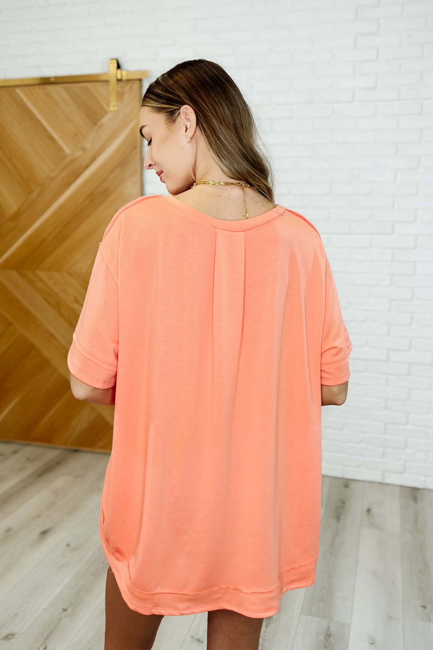 In the Rotation Exposed Seam Tee in Apricot Splash