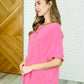 In the Rotation Exposed Seam Tee in Hot Pink