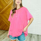 In the Rotation Exposed Seam Tee in Hot Pink