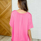 In the Rotation Exposed Seam Tee in Hot Pink