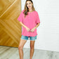 In the Rotation Exposed Seam Tee in Hot Pink