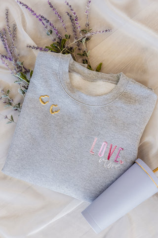 Love More Embroidered Sweatshirt - 1985 the VAULT Boutique