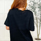 Back view of the Layback Relaxed Basic Tee in Black, showcasing its oversized fit and casual style.