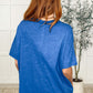 Woman wearing the Layback Relaxed Basic Tee in Royal Blue, showcasing the back view with a relaxed fit.