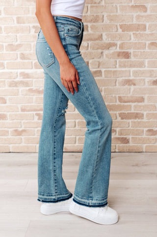 Isla Mid Rise Distressed Released Hem Bootcut Jeans - 1985 the VAULT Boutique