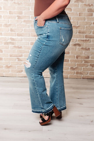 Isla Mid Rise Distressed Released Hem Bootcut Jeans - 1985 the VAULT Boutique