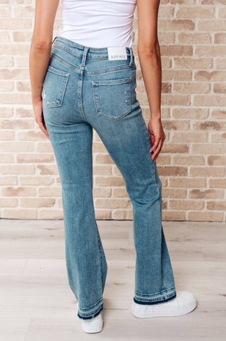 Isla Mid Rise Distressed Released Hem Bootcut Jeans - 1985 the VAULT Boutique