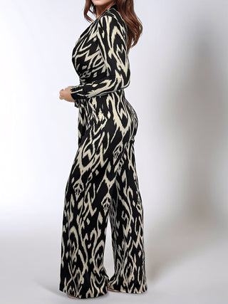 Full Size Leopard Tie Waist Long Sleeve Jumpsuit Plus Size - 1985 the VAULT Boutique