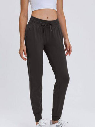 Double Take Tied Joggers with Pockets - 1985 the VAULT Boutique