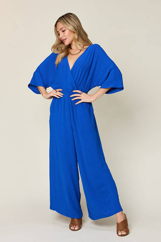 Double Take Full Size Surplice Wide Leg Jumpsuit with Pockets - 1985 the VAULT Boutique