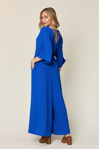 Double Take Full Size Surplice Wide Leg Jumpsuit with Pockets - 1985 the VAULT Boutique