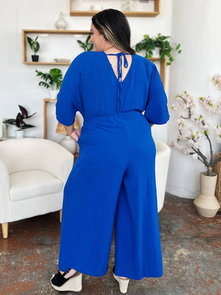 Double Take Full Size Surplice Wide Leg Jumpsuit with Pockets - 1985 the VAULT Boutique